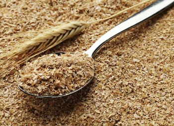 Wheat bran and spoon