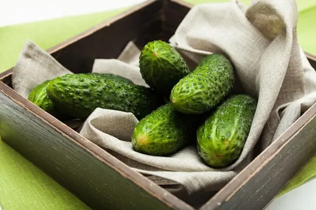 Cucumbers in wooden box